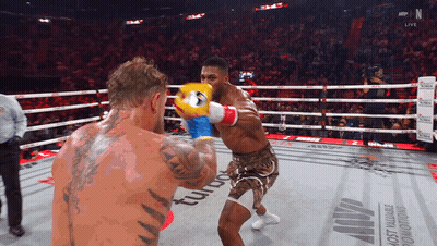 Two Boxers Fighting In Ring GIF