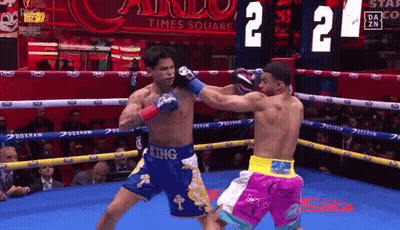 Two Boxers Fighting In Ring One Wearing King Shorts GIF