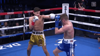 Two Boxers Fighting In Ring With OG Shorts GIF