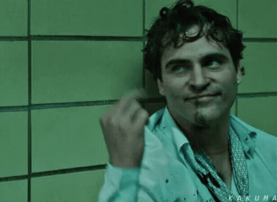 Two Boxers Fighting, One With Back Tattoo GIF