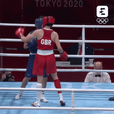 Two Boxers In Ring One In Red GBR Shirt GIF