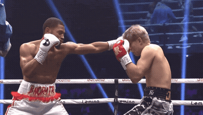 Two Boxers In Ring Shorts Saying Bnorytr GIF