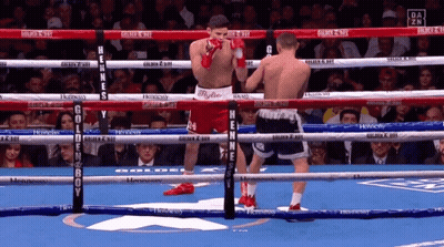 Two Boxers In Ring With Golden Boy Sign GIF
