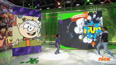 Two Boys Are Dancing In Front Of A Nickelodeon Advertisement GIF
