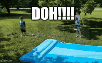Two Boys Are Playing With A Water Slide That Says Doh On It GIF
