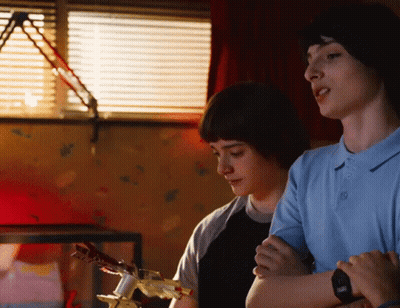 Two Boys Are Standing Next To Each Other With One Wearing A Watch That Says Rolex GIF