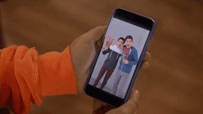 Two Boys Holding Comic Book Vampire Pilot GIF