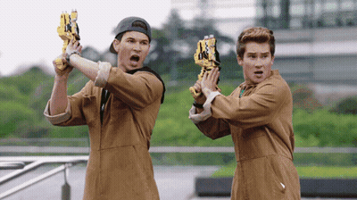 Two Boys Holding Guns One Wearing Hat GIF