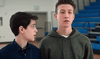 Two Boys In Gym Looking At Each Other GIF