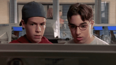 Two Boys Looking At Computer Screen GIF