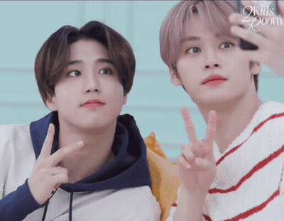 Two Boys Posing One In Kids Room Sweater GIF