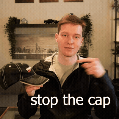 Two Boys Sitting At Desk With Cap Check GIF