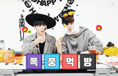 Two Boys Sitting At Halloween Party GIF