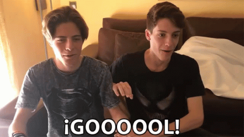 Two Boys Sitting On Couch Saying Goooool GIF