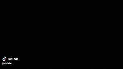 Two Boys Standing Next To Each Other With Sunset GIF