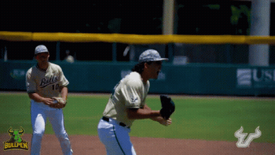 Two Bullpen Baseball Players On The Field With A Bullpen Logo In The Background GIF
