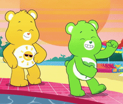 Two Care Bears Standing Next To Each Other On The Beach GIF