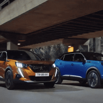 Two Cars Are Parked Next To Each Other And One Has A License Plate That Says Tw-088-Xh GIF