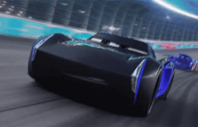Two Cars Are Racing On A Race Track And One Has The Word Jackson Storm On The Front GIF
