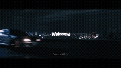 Two Cars Driving Past Welcome Sign GIF