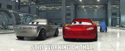 Two Cars In Garage With Still Working On That GIF