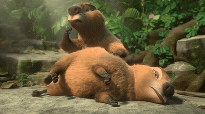 Two Cartoon Animals Laying On Their Backs GIF