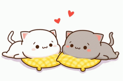 Two Cartoon Cats Are Laying On Pillows With Hearts Surrounding Them GIF