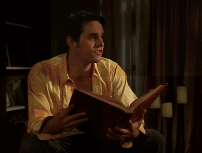 Two Cartoon Characters And Letter K GIF