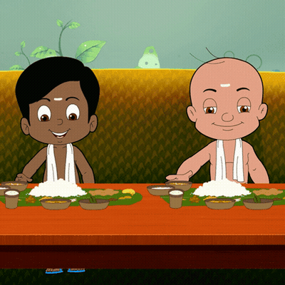 Two Cartoon Characters Are Sitting At A Table With Plates Of Food GIF