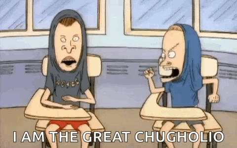 Two Cartoon Characters Are Sitting At Desks In A Classroom And One Of Them Is Wearing A Hoodie . GIF