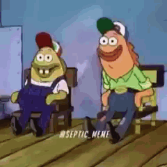 Two Cartoon Characters Are Sitting Next To Each Other On A Wooden Floor . GIF