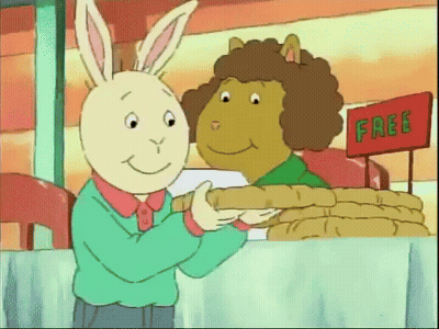 Two Cartoon Characters Are Standing In Front Of A Table With A Sign That Says Free GIF