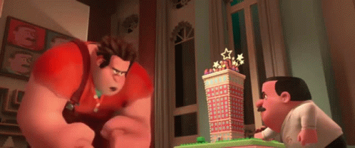 Two Cartoon Characters Are Standing Next To A Gingerbread Building . GIF