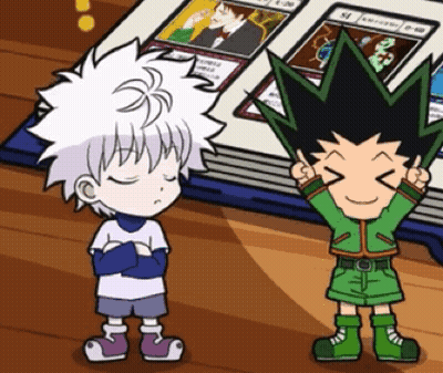 Two Cartoon Characters Are Standing Next To Each Other On A Wooden Floor . GIF