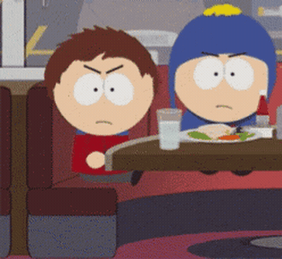 Two Cartoon Characters At Table With Food GIF
