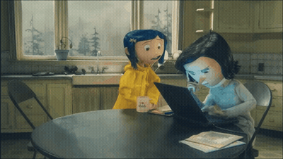 Two Cartoon Characters At Table With I Love Wish Mug GIF