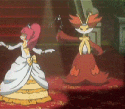 Two Cartoon Characters Dancing On Red Carpet GIF