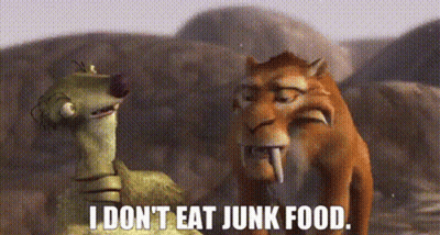 Two Cartoon Characters From The Movie Ice Age Are Standing Next To Each Other And Talking . GIF