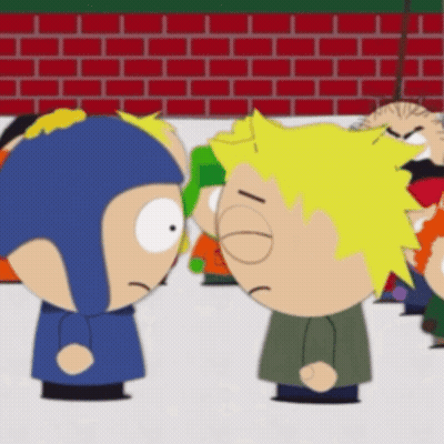 Two Cartoon Characters In Front Of Red Brick Wall GIF