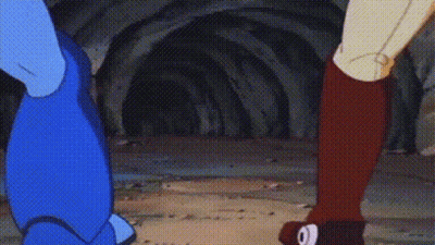 Two Cartoon Characters In Tunnel GIF