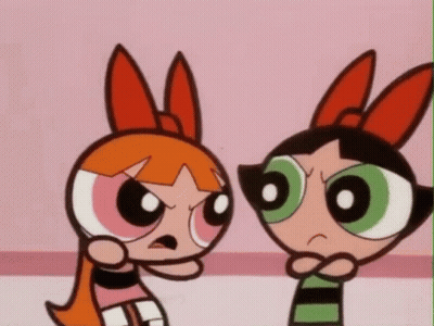 Two Cartoon Characters Looking At Each Other GIF