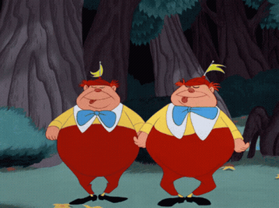 Two Cartoon Characters One With Banana On Head GIF