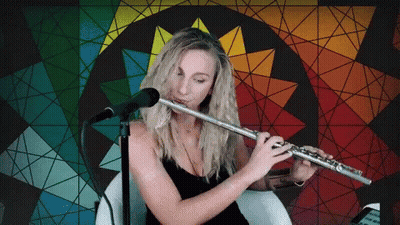 Two Cartoon Characters Playing Flutes Under Cherry Blossoms GIF