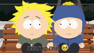 Two Cartoon Characters Sitting On Bench Saying Marry Me GIF