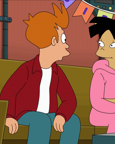 Two Cartoon Characters Sitting On Couch, One With Letter I On Shirt GIF