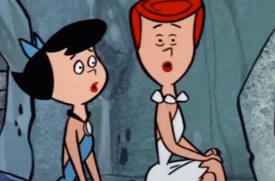 Two Cartoon Characters Sitting One Surprised GIF