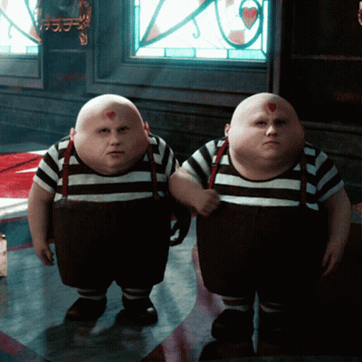 Two Cartoon Characters Standing GIF