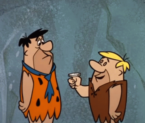 Two Cartoon Characters Standing Next To Each Other With One Pointing At A Diamond GIF