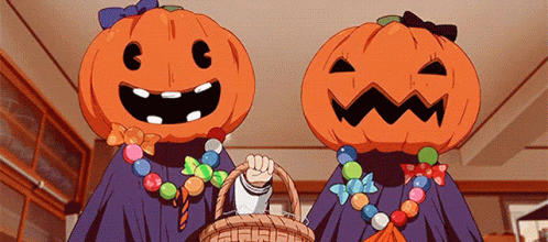 Two Cartoon Characters With Pumpkins On Their Heads And A Basket Of Candy . GIF