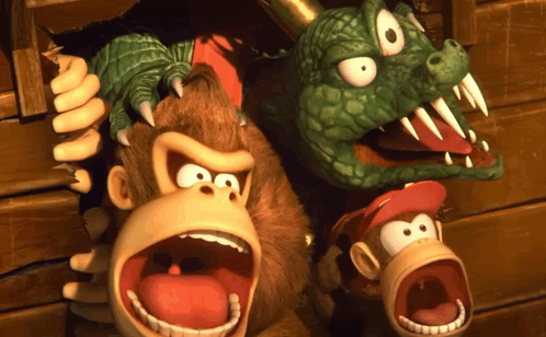 Two Cartoon Characters With Their Mouths Open And One Has A Crocodile On His Head GIF